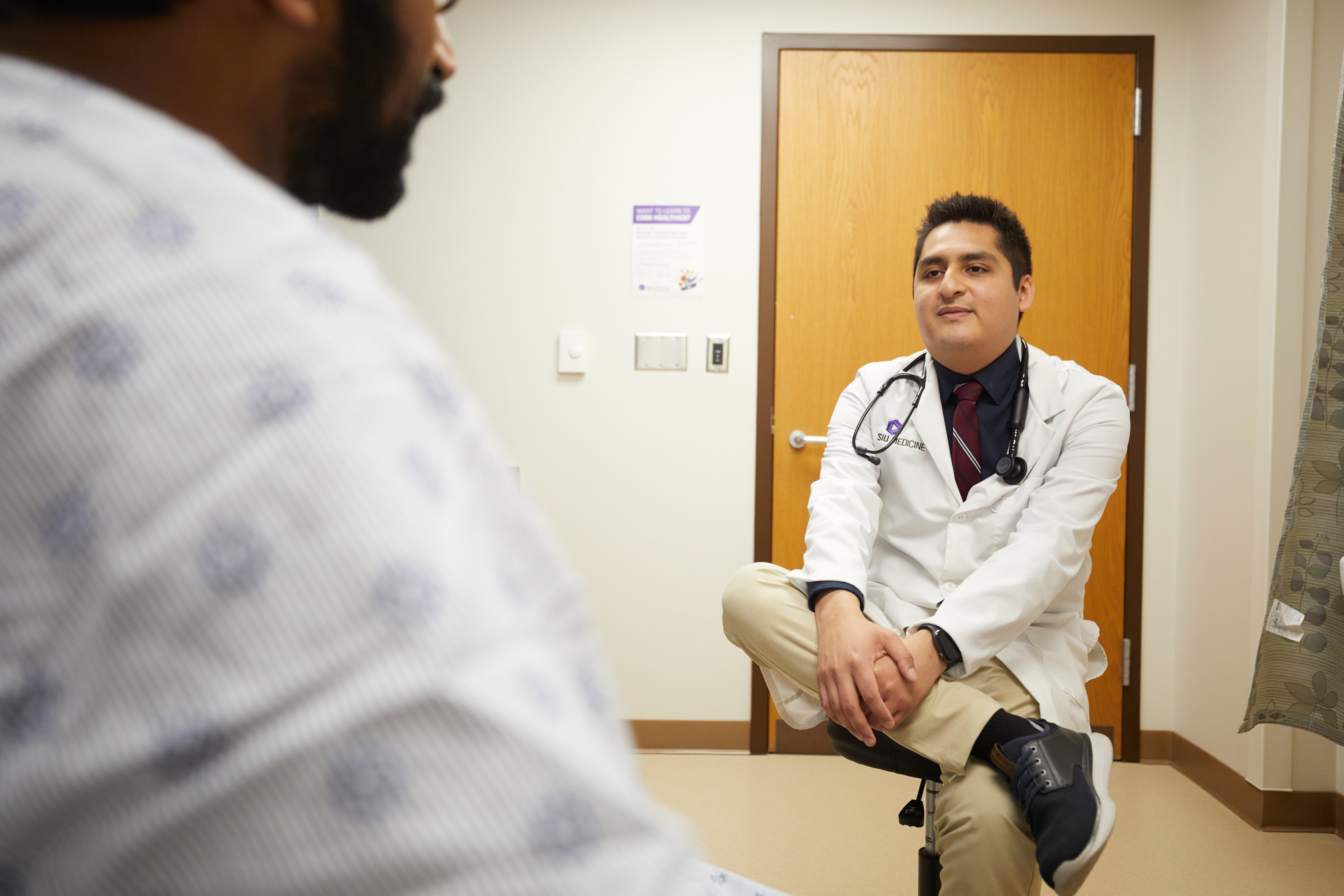 Dr. Julio Mendoza Estrada with a patient
