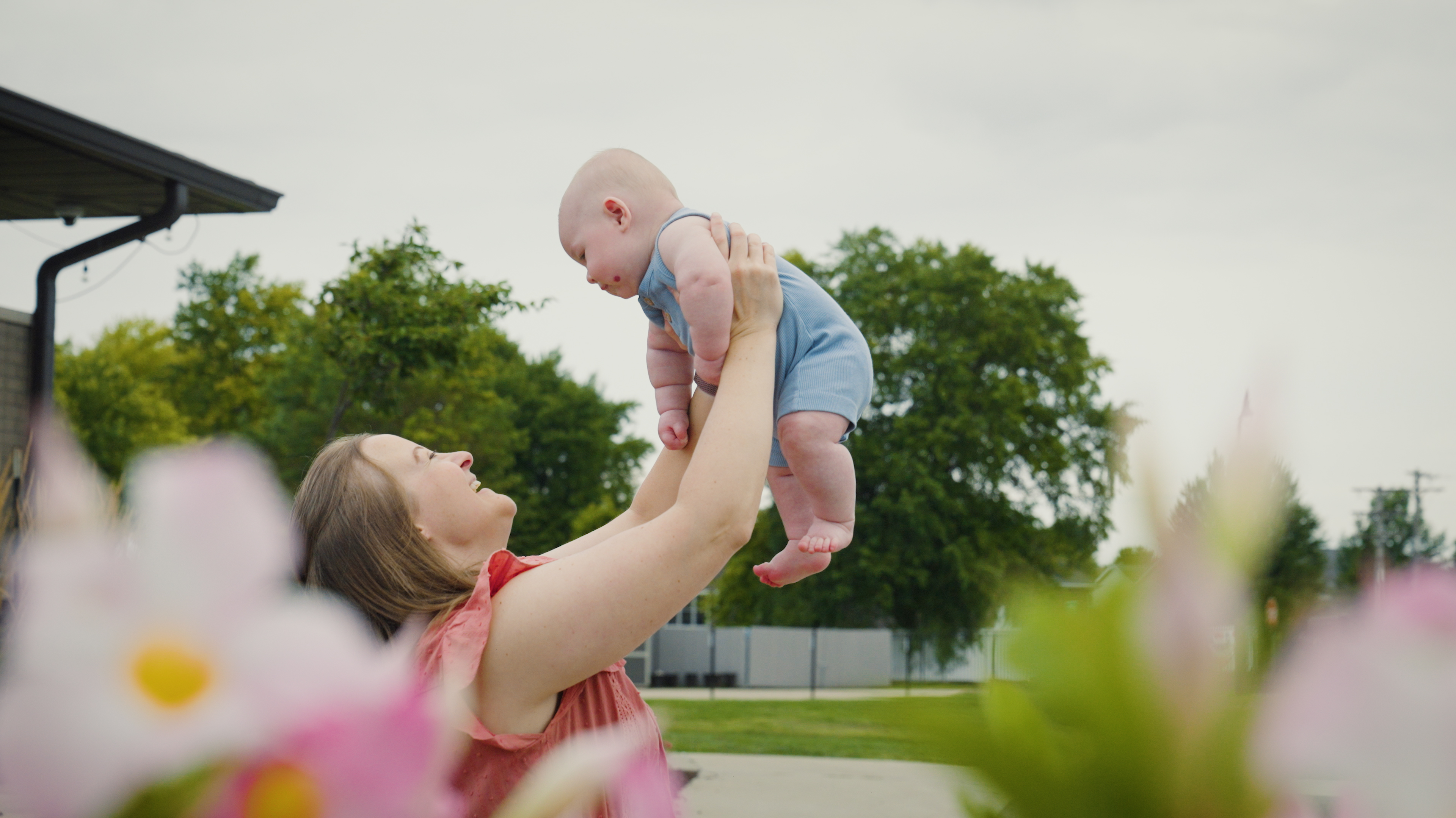Denise Klemm raises Baby Lucas up high