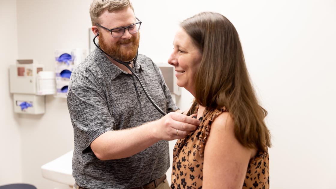 Quincy Family Medicine Clinic Photos - Tanner Eiben, MD with a patient