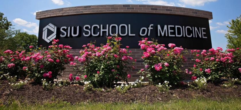 Sign with roses down low