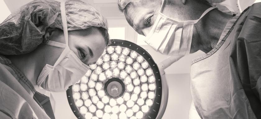 Plastic surgeons operate 