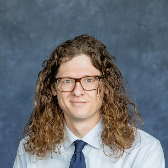 Artemus Holguin-Mills-Hoffman, MD