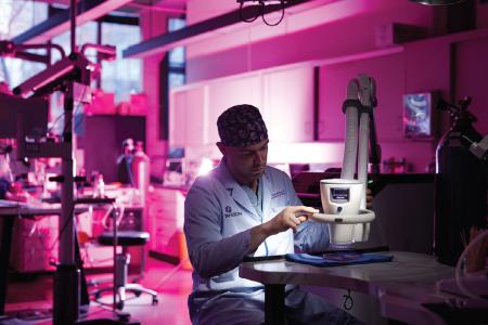 A SIU student working in a research lab