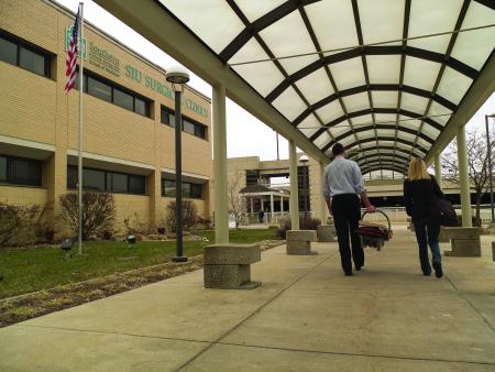 Baby Brenna leaves hospital with her parents
